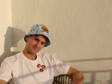 Load image into Gallery viewer, DBAD Happy Face Blue Tye-dye Bucket Hat Points Ya Ass Positive!
